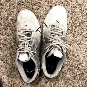 Nike vapor white cleats. Used but still good too small for me football cleats